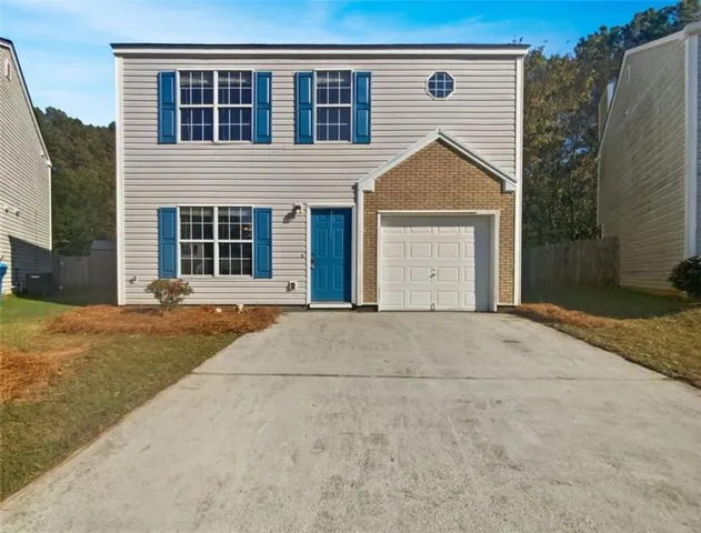 a view of backyard of house