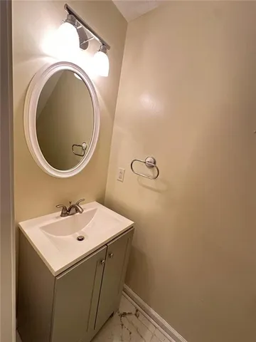 a bathroom with a sink and a vanity