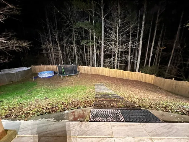 a view of swimming pool with patio