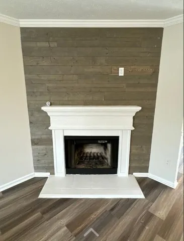 a fireplace with wooden floor