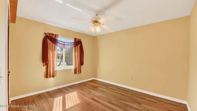a patio with patio table and chairs