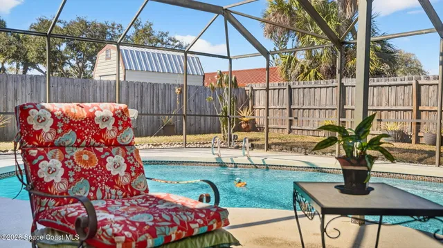 a view of a backyard of a house