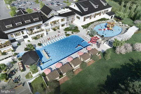 an aerial view of house with yard