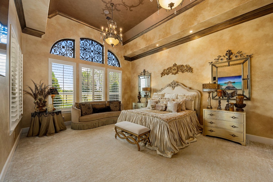 26515 Ashley Ridge Lane Katy, TX 77494 - Photo 24 of 50 a spacious bedroom with a bed and a large window