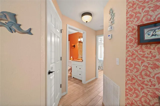 a bathroom with a sink a toilet and shower curtain