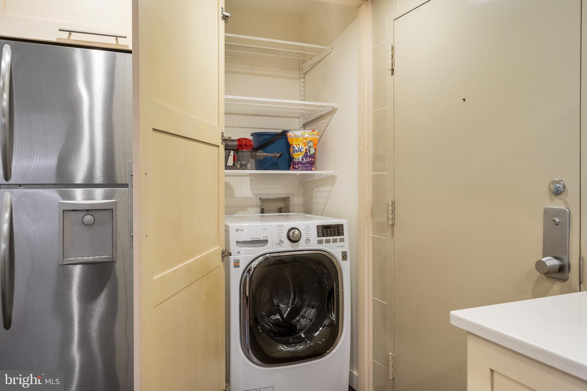1301 20th Street Northwest, Unit 109 Washington, DC 20036 - Photo 23 of 33 a utility room with dryer and washer