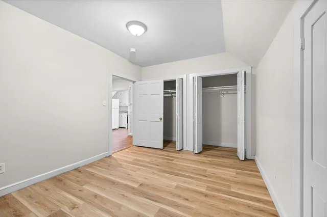 a view of a livingroom with wooden floor