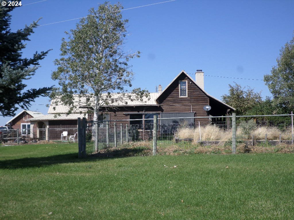 64654 Rancho Road Enterprise, OR 97828 - Photo 2 of 25 a front view of house with yard and green space