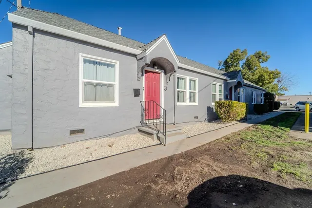 a spacious bathroom with a tub and shower