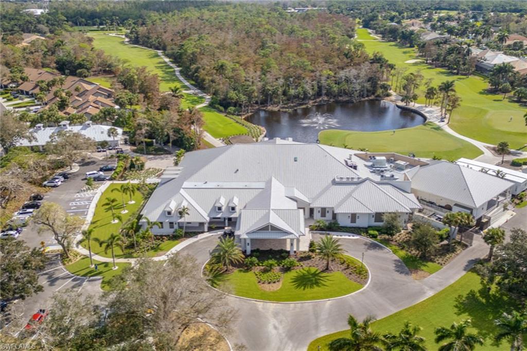 764 Eagle Creek Drive, Unit 301 Naples, FL 34113 - Photo 25 of 31 an aerial view of house with a swimming pool