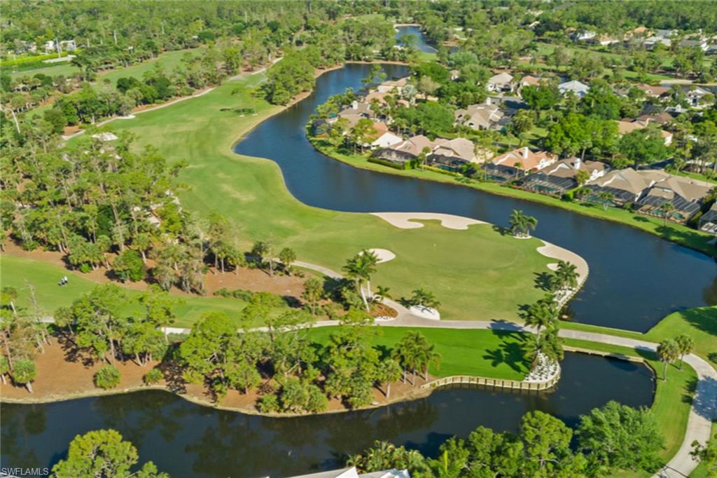 764 Eagle Creek Drive, Unit 301 Naples, FL 34113 - Photo 26 of 31 an aerial view of a residential houses with outdoor space