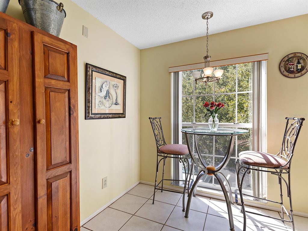 4415 Longmeadow, Unit 44 Sarasota, FL 34235 - Photo 6 of 42 a dining room with furniture and window