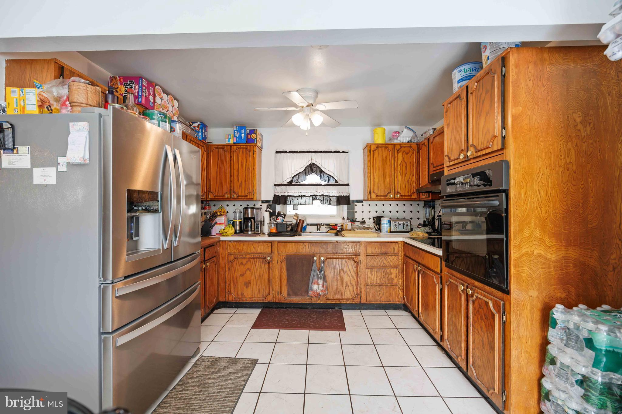 35 Ember Lane Willingboro, NJ 08046 - Photo 15 of 30 a kitchen with granite countertop stainless steel appliances and cabinets