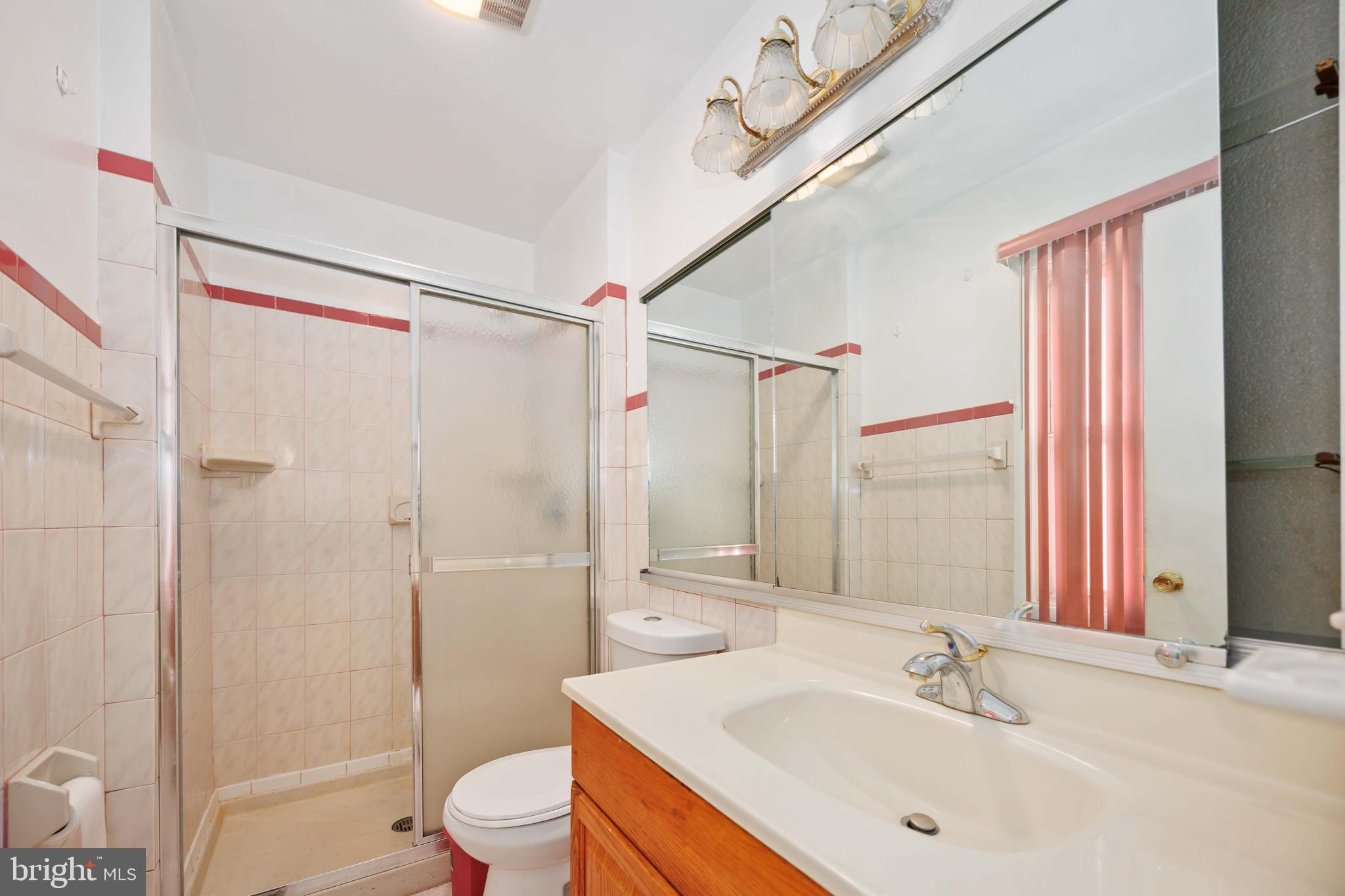 35 Ember Lane Willingboro, NJ 08046 - Photo 24 of 30 a bathroom with a sink toilet tub and shower