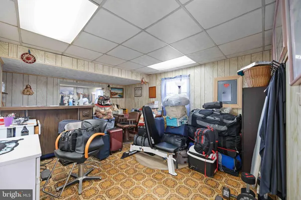 a view of storage and utility room with washer and dryer