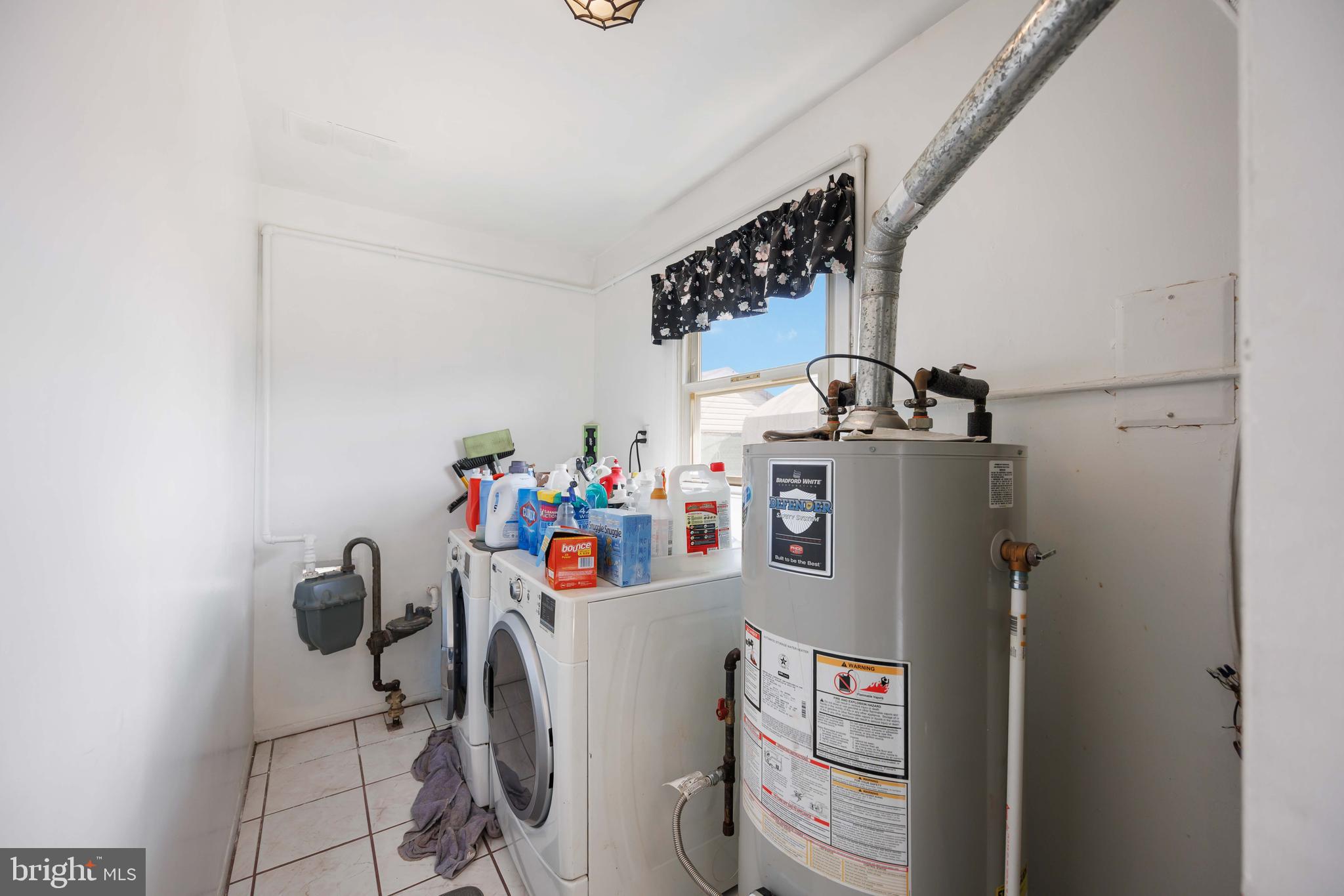 35 Ember Lane Willingboro, NJ 08046 - Photo 26 of 30 a view of storage and utility room with washer and dryer