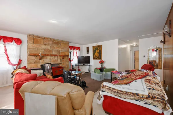 a bed room with two bed and a couch
