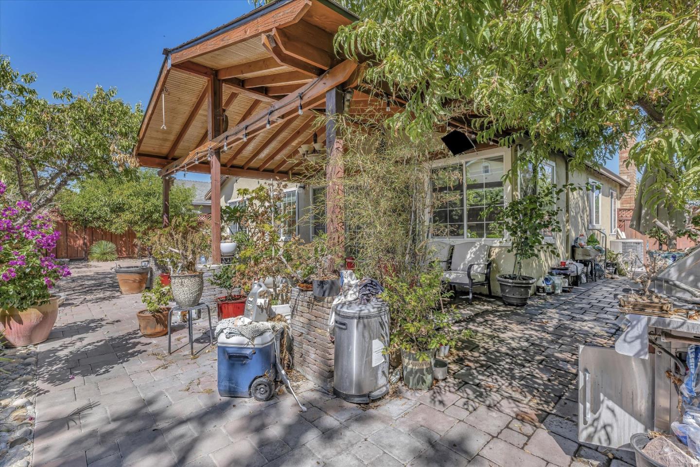 252 Sposito Circle San Jose, CA 95136 - Photo 13 of 50 a view of a chair and table in the backyard
