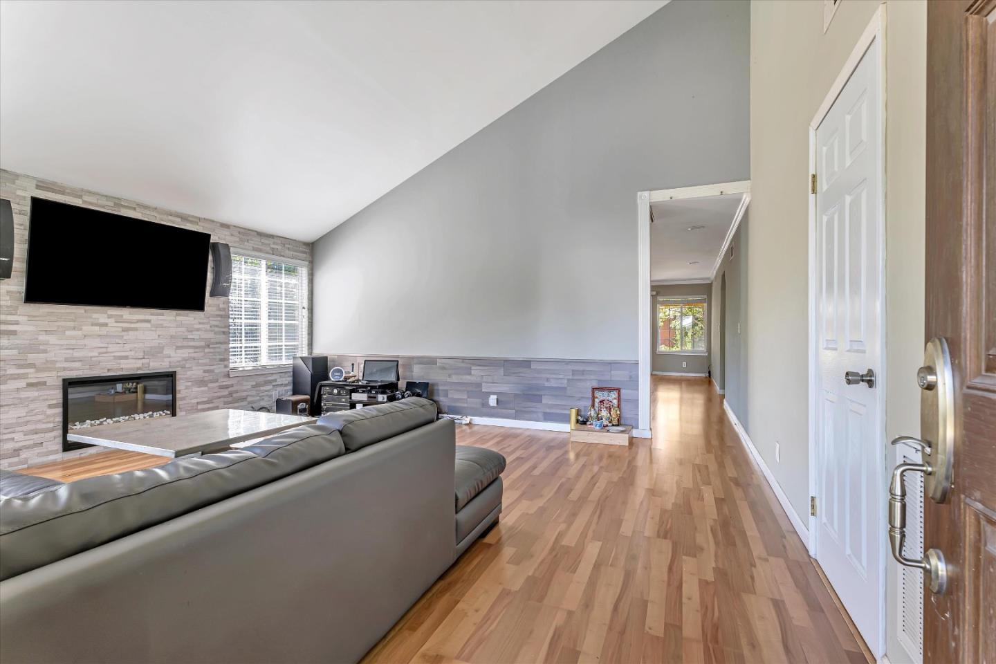 252 Sposito Circle San Jose, CA 95136 - Photo 18 of 50 a living room with fireplace furniture and a flat screen tv