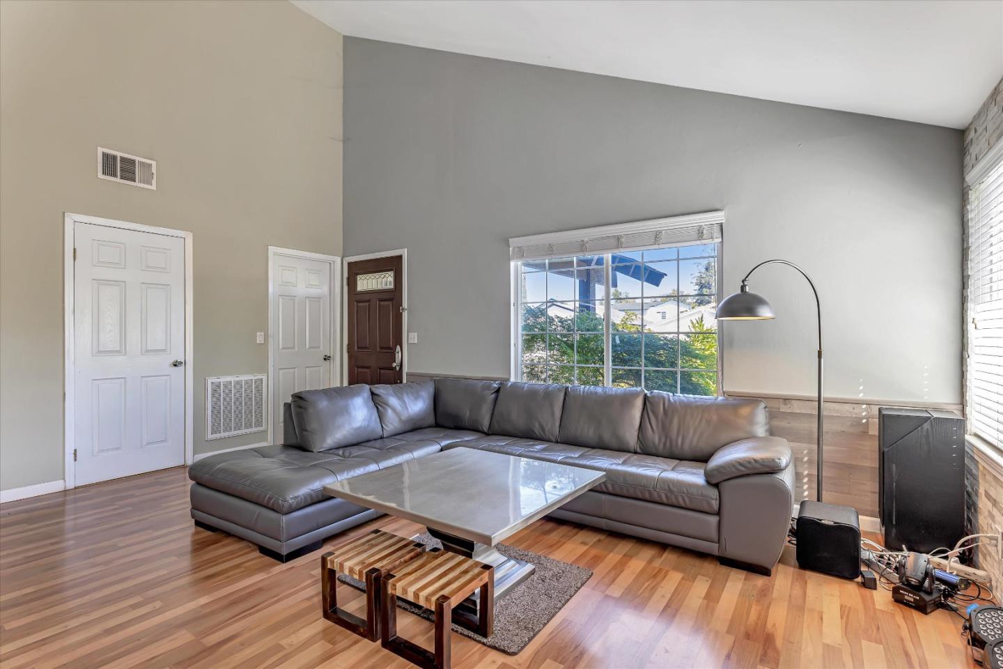 252 Sposito Circle San Jose, CA 95136 - Photo 19 of 50 a living room with furniture and a flat screen tv