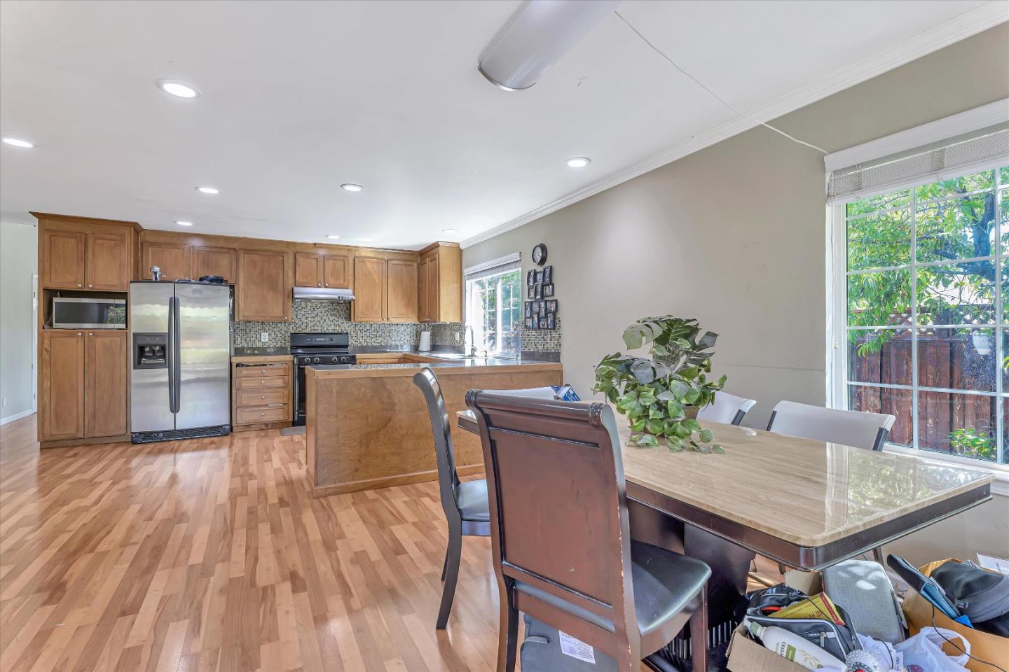 252 Sposito Circle San Jose, CA 95136 - Photo 27 of 50 a view of a dining room with furniture window and wooden floor