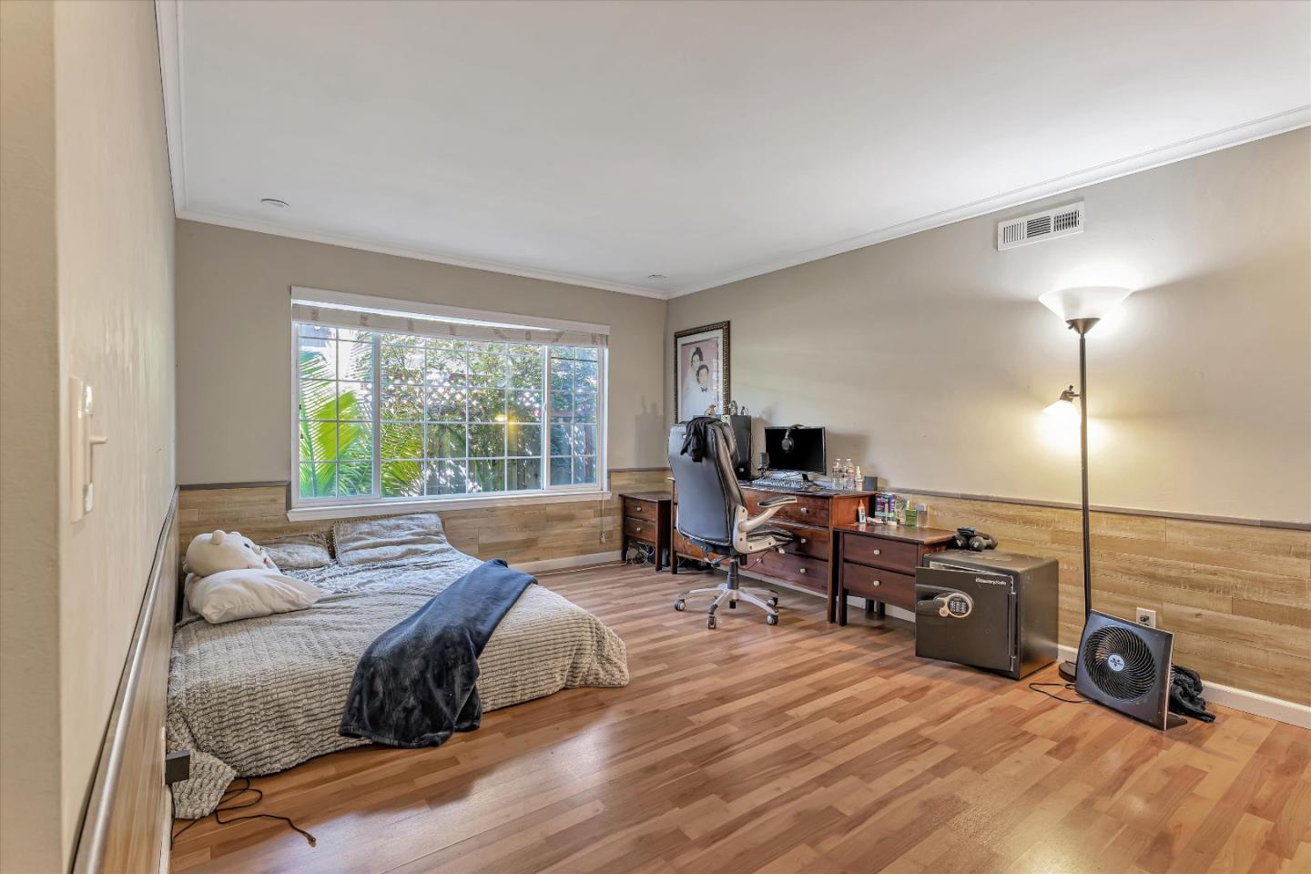 252 Sposito Circle San Jose, CA 95136 - Photo 39 of 50 a bed room with bed and a large window