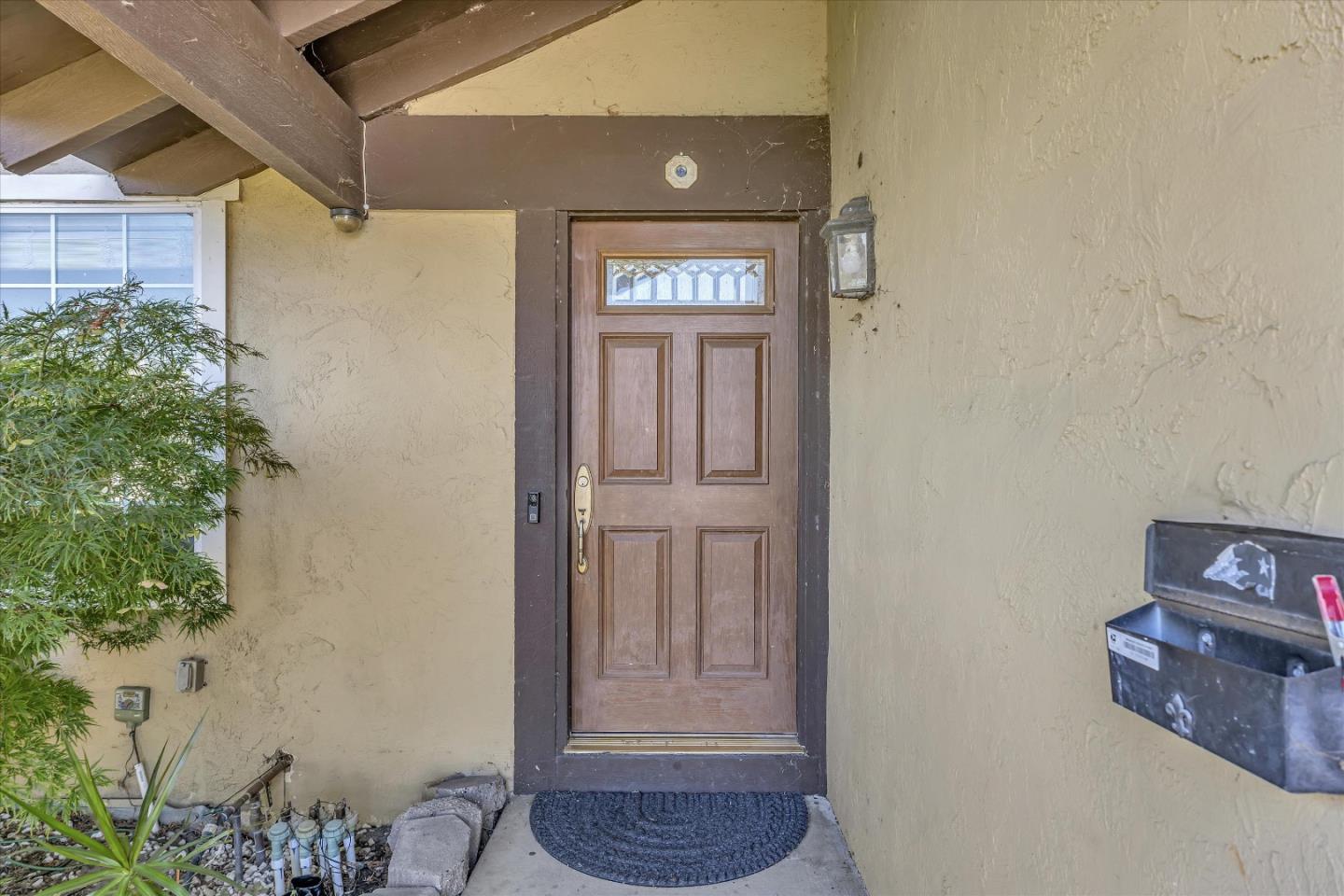 252 Sposito Circle San Jose, CA 95136 - Photo 4 of 50 a view of an entryway with a pot