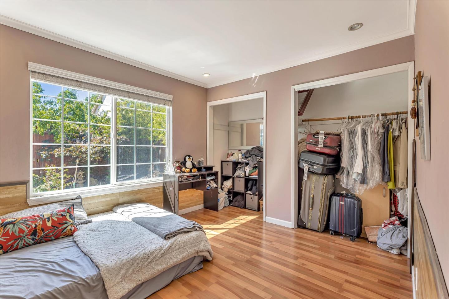 252 Sposito Circle San Jose, CA 95136 - Photo 47 of 50 a bedroom with a bed and a large window