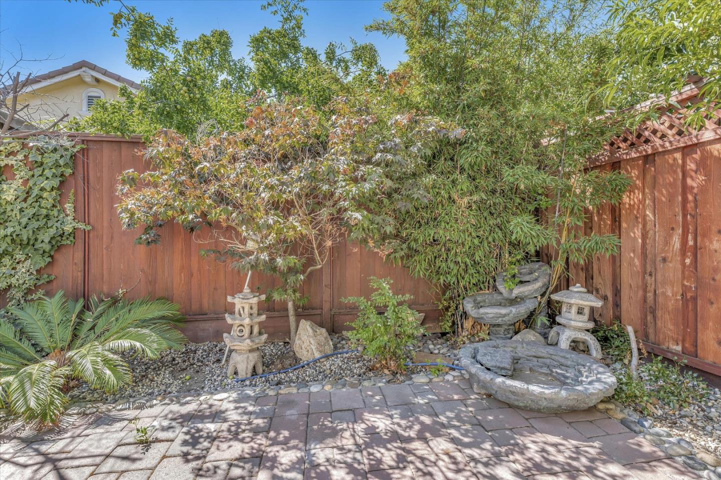 252 Sposito Circle San Jose, CA 95136 - Photo 10 of 50 a backyard of a house with lots of green space