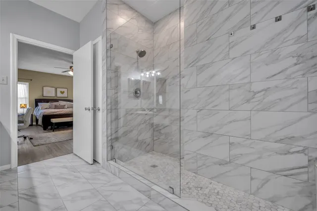 a view of a bathroom with shower