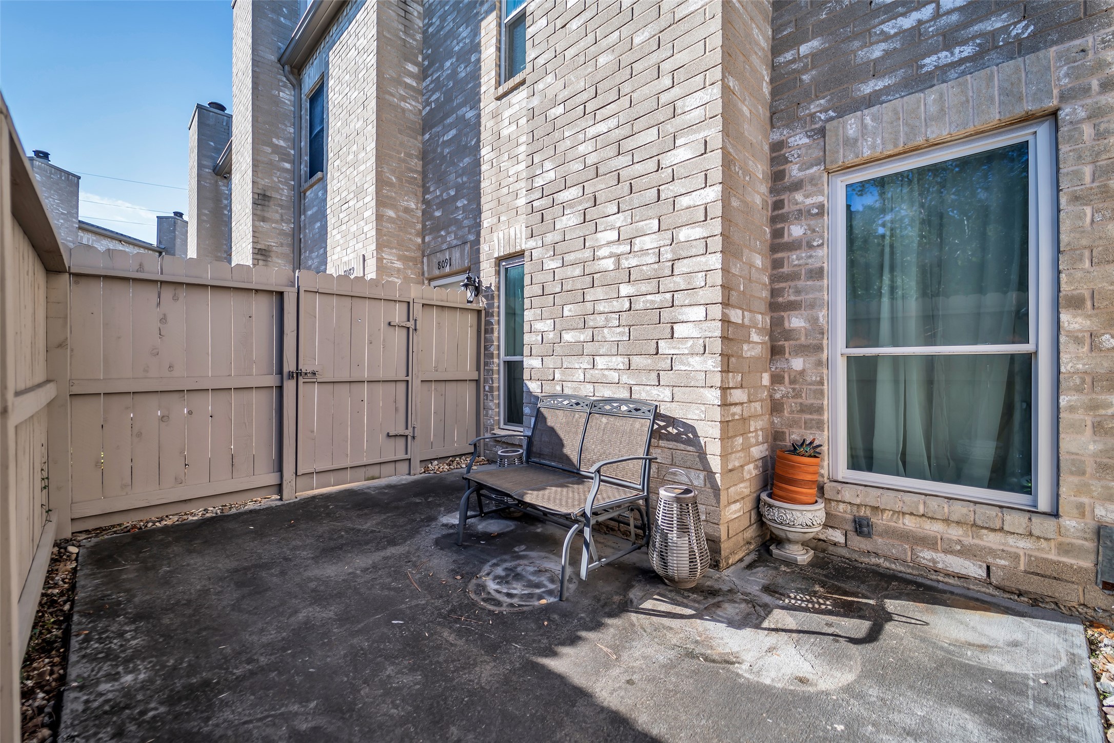 8091 El Mundo Street, Unit 8091 Houston, TX 77054 - Photo 20 of 22 a view of a room with a window and chair
