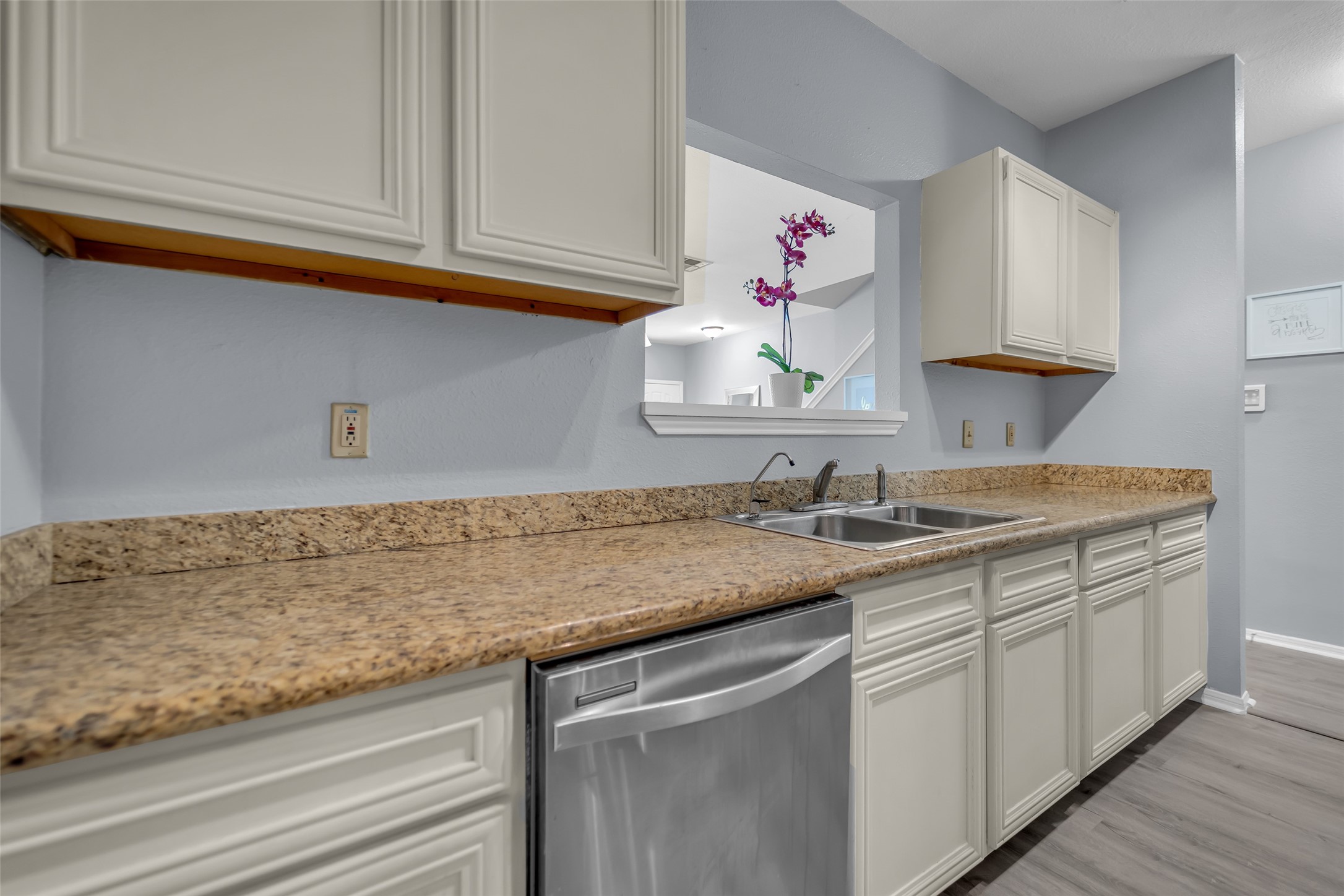 8091 El Mundo Street, Unit 8091 Houston, TX 77054 - Photo 10 of 22 a kitchen with sink cabinets and utility