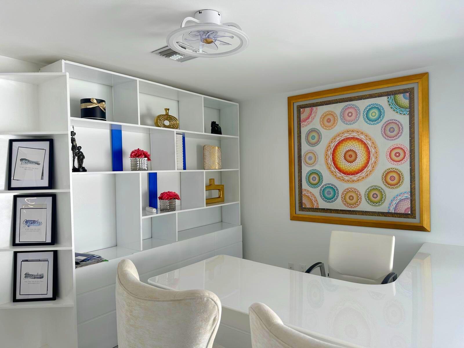 2252 Northwest 53rd Street Boca Raton, FL 33496 - Photo 10 of 23 a room with furniture and wall paintings