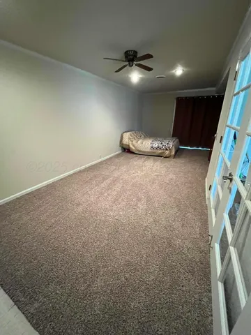 a view of a livingroom with a staircase
