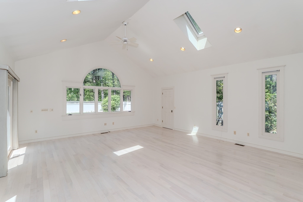 63 Larkspur Drive Amherst, MA 01002 - Photo 19 of 42 an empty room with windows and closet