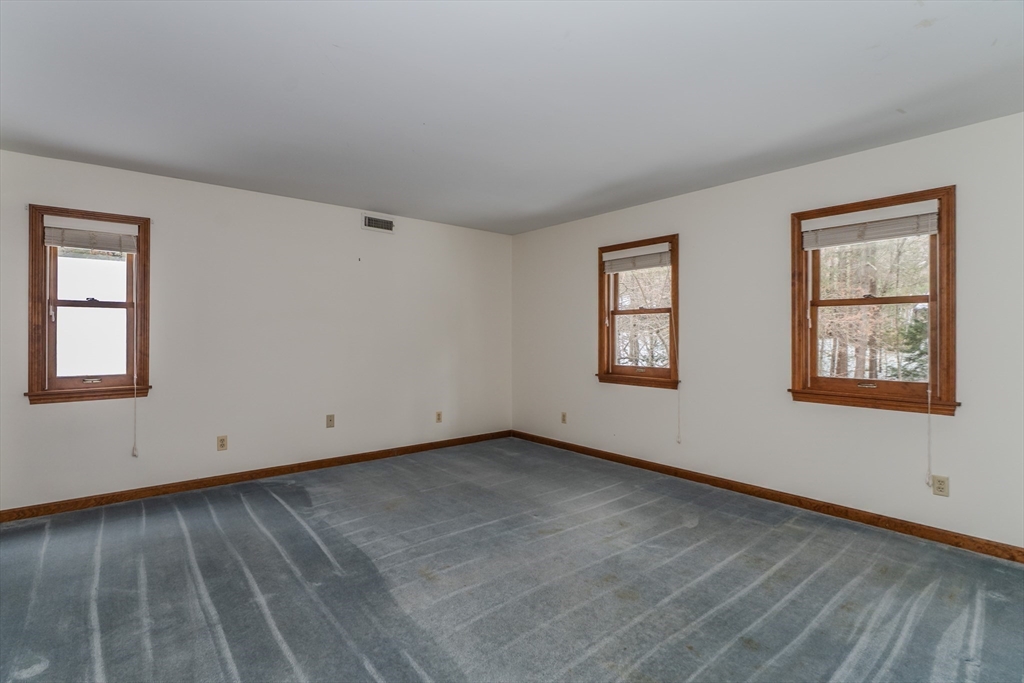 63 Larkspur Drive Amherst, MA 01002 - Photo 27 of 42 a view of an empty room with window