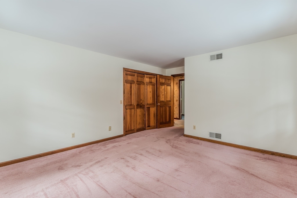 63 Larkspur Drive Amherst, MA 01002 - Photo 28 of 42 an empty room with windows