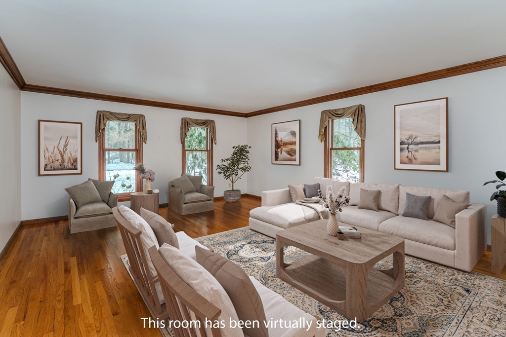 63 Larkspur Drive Amherst, MA 01002 - Photo 4 of 42 a living room with furniture and wooden floor