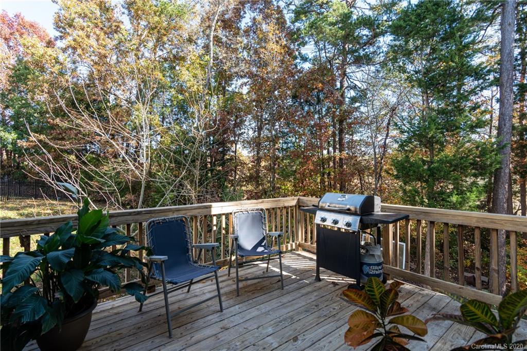 7838 East Berkeley Road Denver, NC 28037 - Photo 15 of 34 a view of balcony with wooden floor and outdoor seating