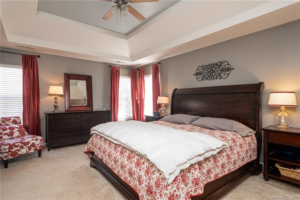 7838 East Berkeley Road Denver, NC 28037 - Photo 21 of 34 a bedroom with a bed and window
