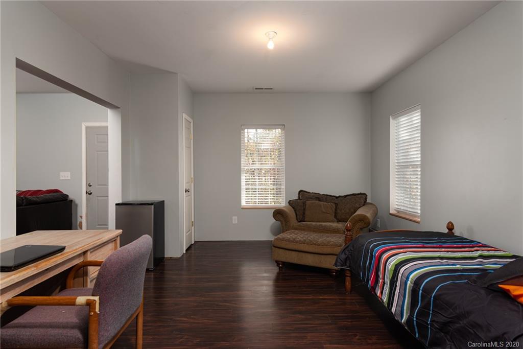 7838 East Berkeley Road Denver, NC 28037 - Photo 30 of 34 a living room with furniture and a window