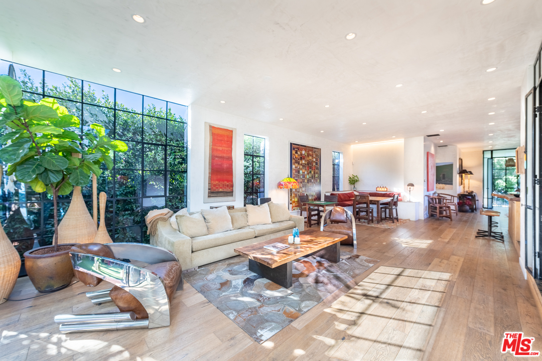 910 Dickson Street Marina del Rey, CA 90292 - Photo 1 of 52 a living room with furniture large window and wooden floor