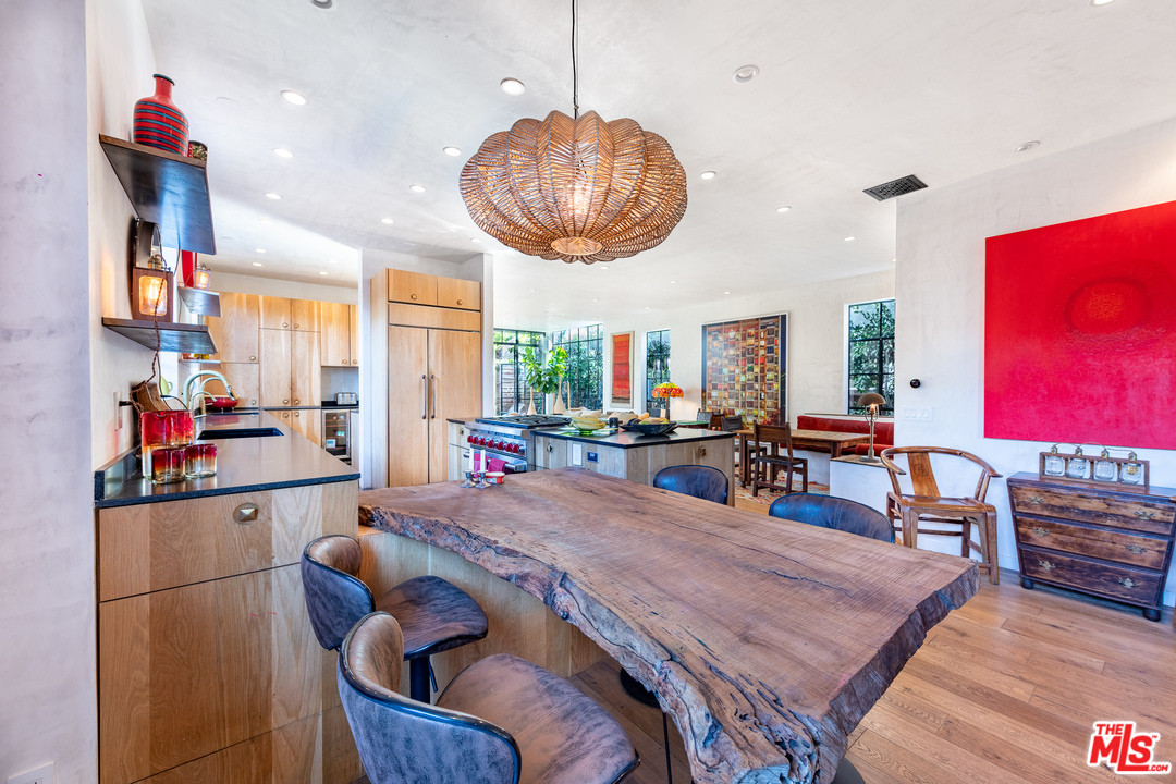 910 Dickson Street Marina del Rey, CA 90292 - Photo 11 of 52 a dining room with furniture and wooden floor