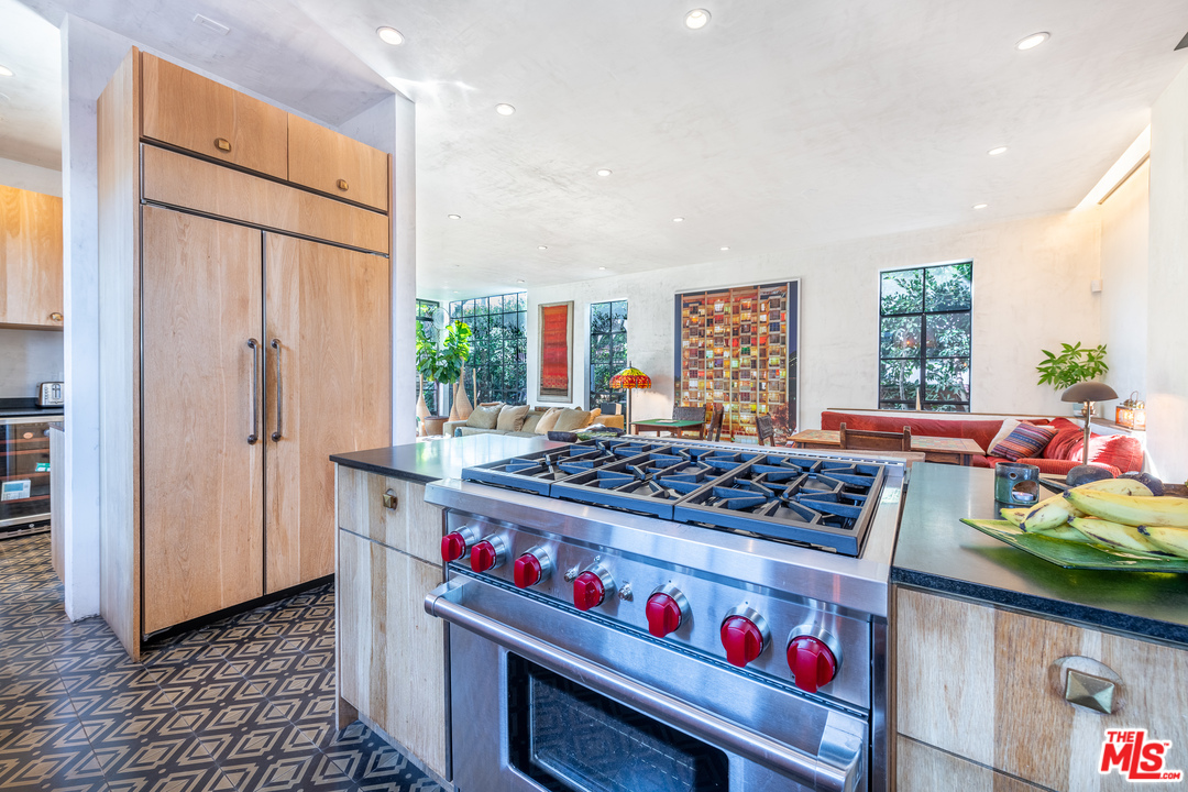 910 Dickson Street Marina del Rey, CA 90292 - Photo 17 of 52 a kitchen with stainless steel appliances granite countertop a refrigerator and stove