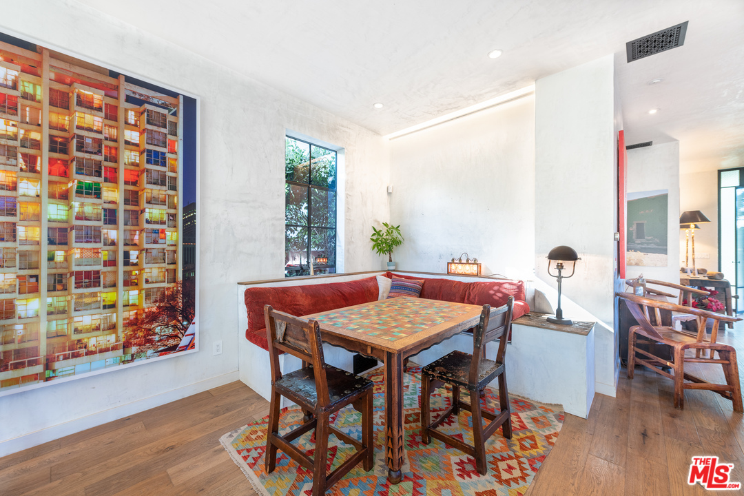 910 Dickson Street Marina del Rey, CA 90292 - Photo 18 of 52 a view of a dining room with furniture and wooden floor