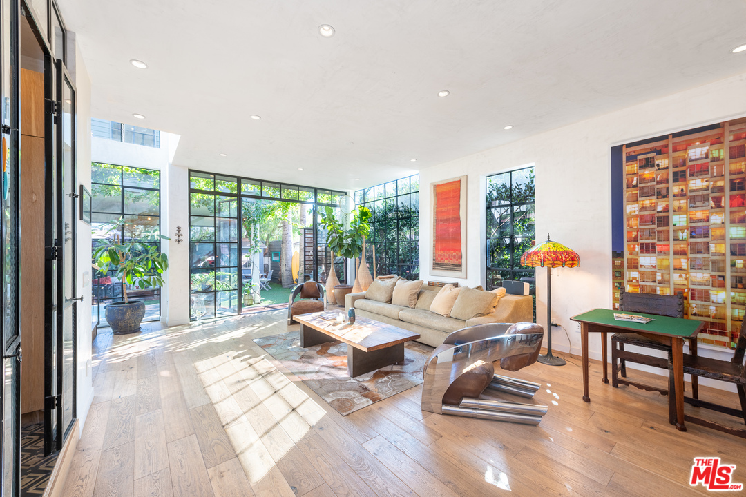 910 Dickson Street Marina del Rey, CA 90292 - Photo 19 of 52 a living room with furniture and floor to ceiling windows