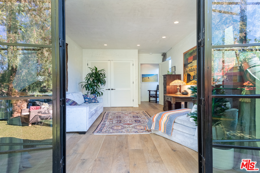 910 Dickson Street Marina del Rey, CA 90292 - Photo 24 of 52 a bedroom with furniture and a large window