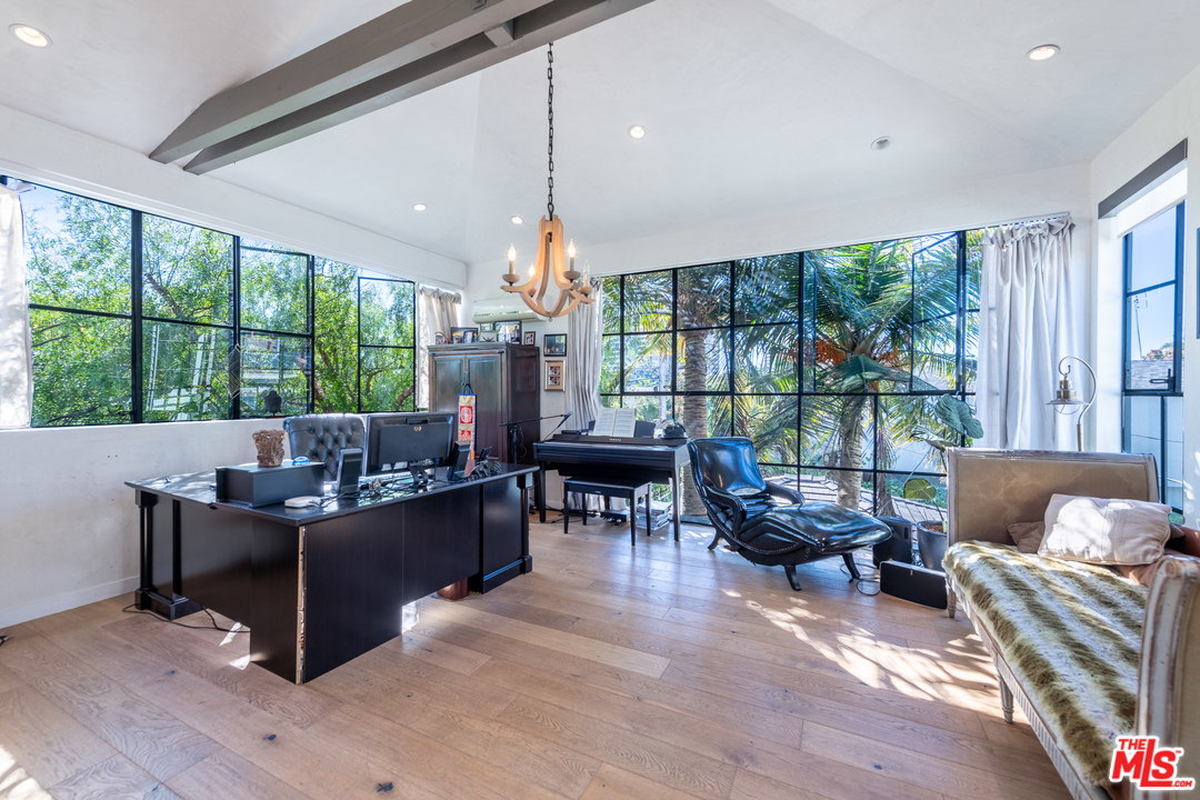 910 Dickson Street Marina del Rey, CA 90292 - Photo 45 of 52 a living room with furniture and a large window