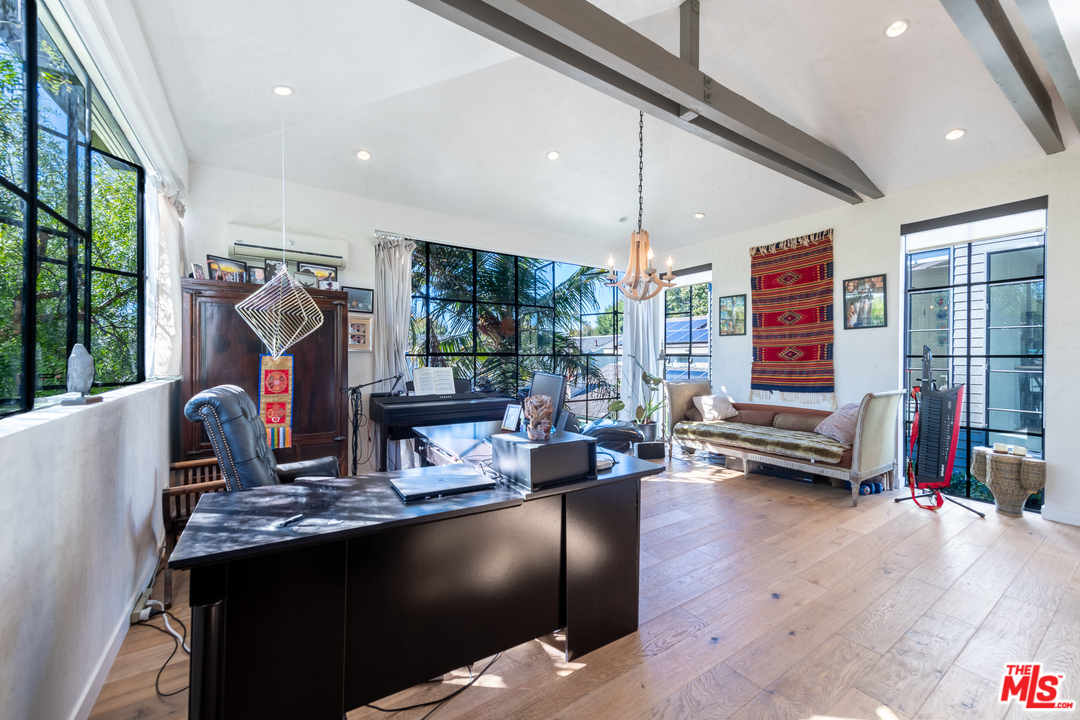 910 Dickson Street Marina del Rey, CA 90292 - Photo 46 of 52 a living room with furniture and a flat screen tv