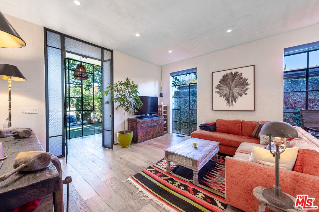 910 Dickson Street Marina del Rey, CA 90292 - Photo 8 of 52 a living room with furniture and a lamp
